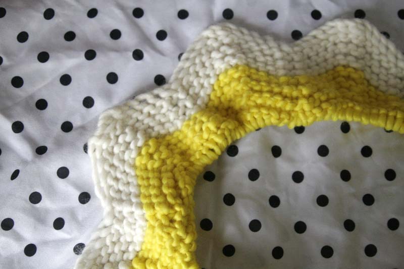 knitting striped blanket