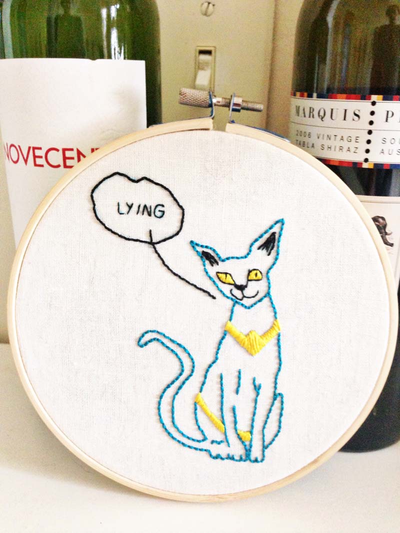 lying cat embroidery